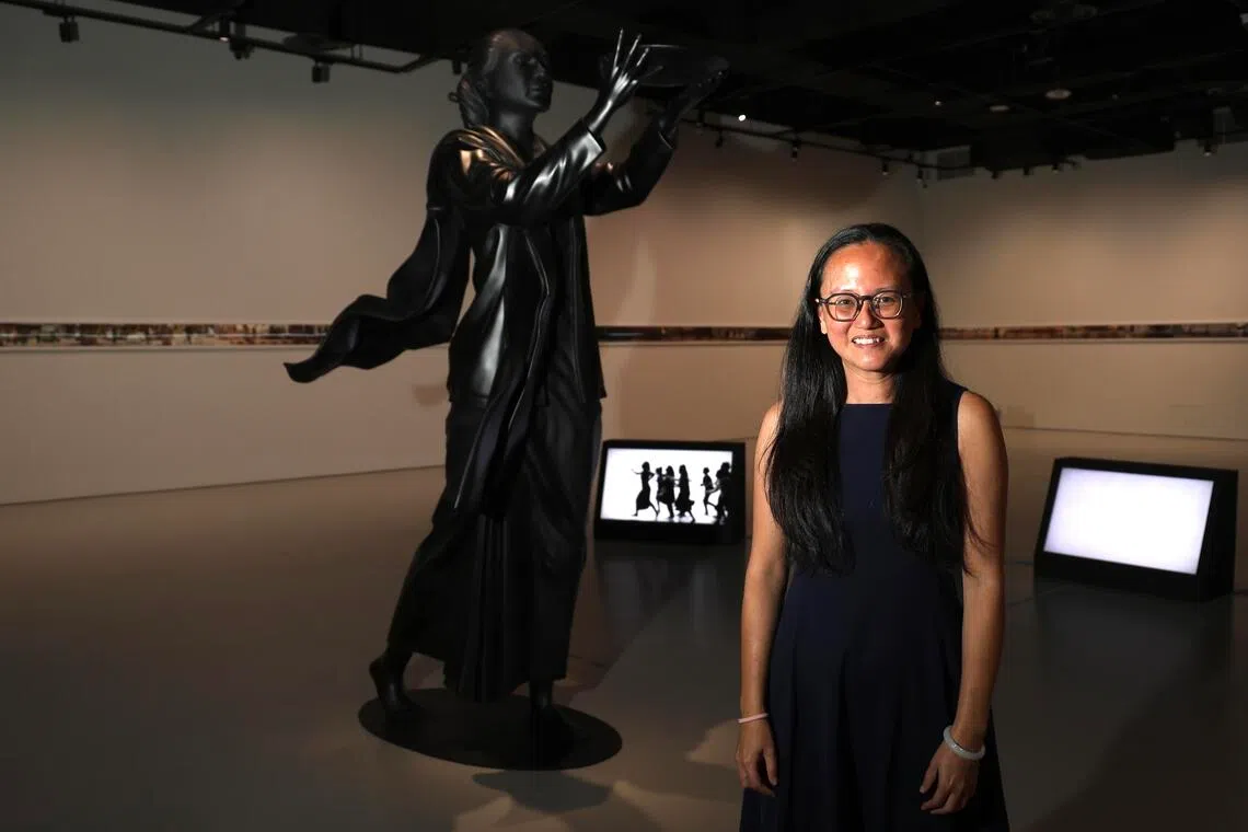 Curator Ong Puay Khim with a sculpture by Malaysian artist Nadiah Bamadhaj at SAM’s new show, SAMCollection: The Present Is Unstable.