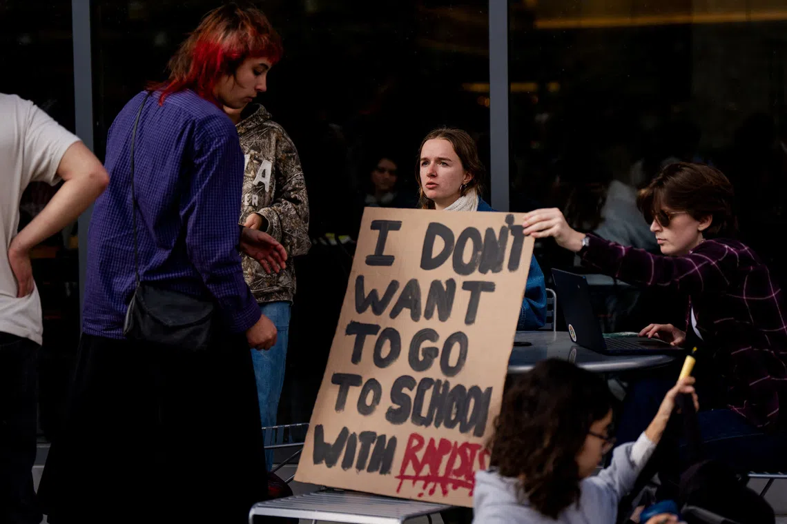 Some of the Cornell University students taking part in a seven-hour sit-in protest in Ithaca, New York, on Oct 7.