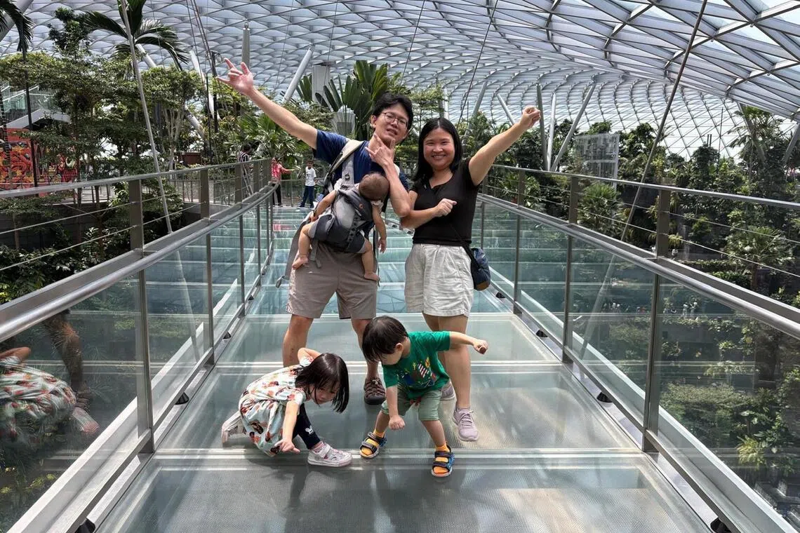 mwdad - Stay-at-home dad Mr Abraham Yeo, 45. together with his wife, Ms Peng Cheng Yu, 31, and their three children aged five, three and one.

credit Abraham Yeo