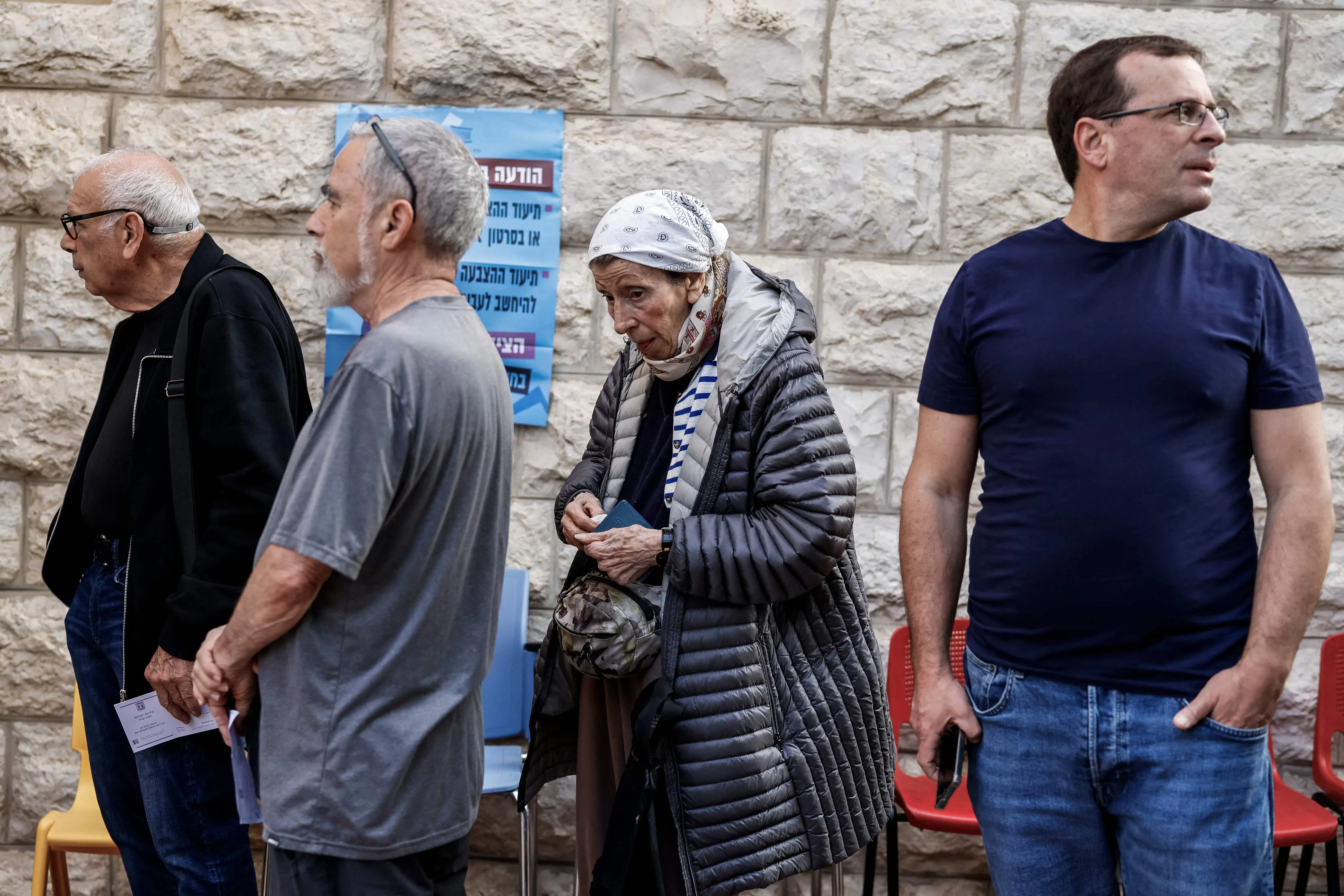 People queuing to vote at a polling station in Jerusalem on Oct 27.