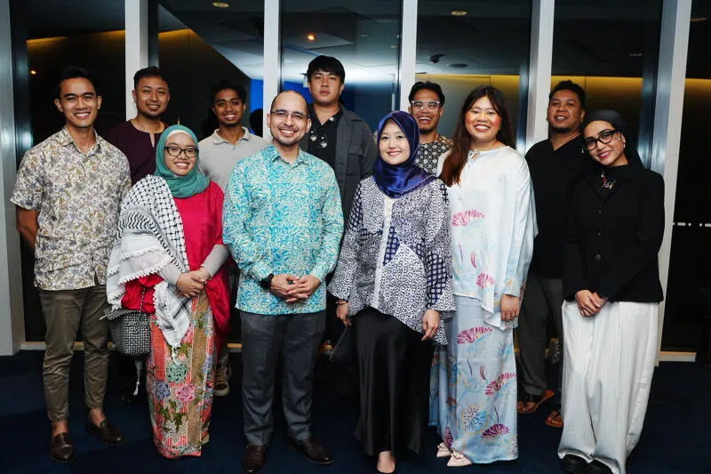 The task force is led by Minister of State for Digital Development and Information and Health Rahayu Mahzam (front row, third from left) and Senior Parliamentary Secretary for Education and National Development Syed Harun Alhabsyi (front row, second from left).