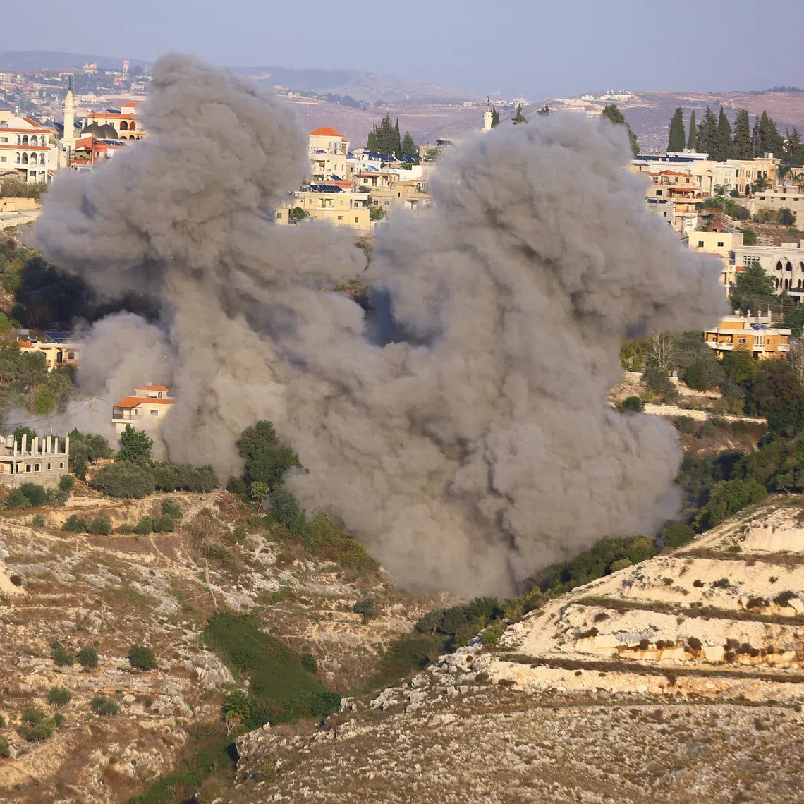 Smoke rises after Israeli strikes following Israeli military's evacuation orders, in Chehour, southern Lebanon November 19, 2025. REUTERS/Ali Hankir