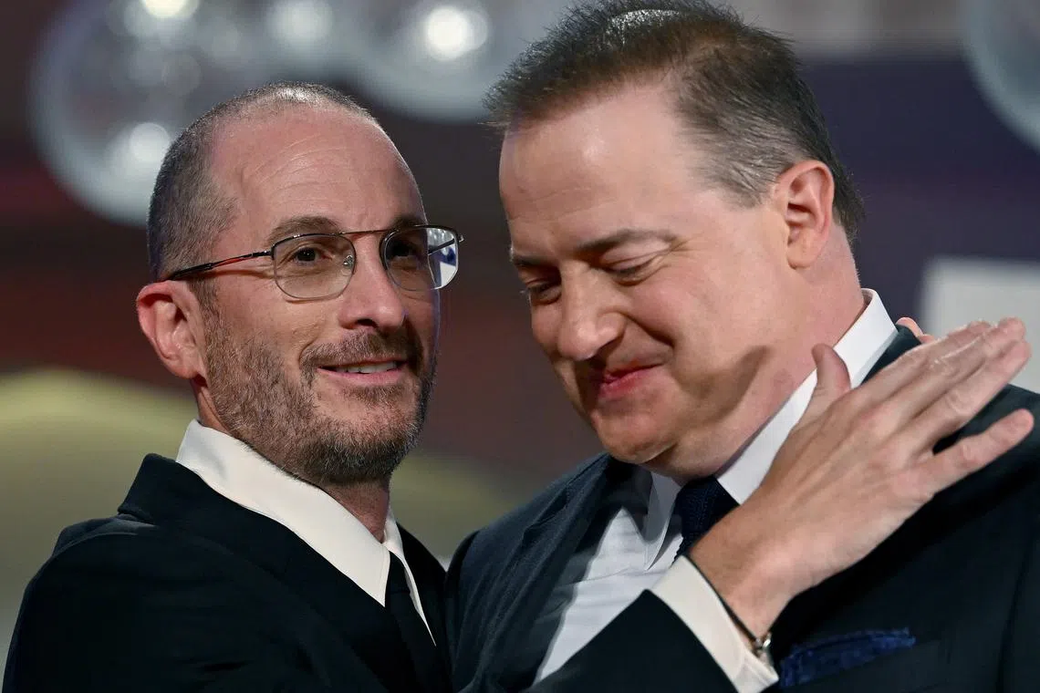 US director Darren Aronofsky (left) and US-Canadian actor Brendan Fraser at the premiere of The Whale during the 79th annual Venice International Film Festival on Sept 4, 2022.