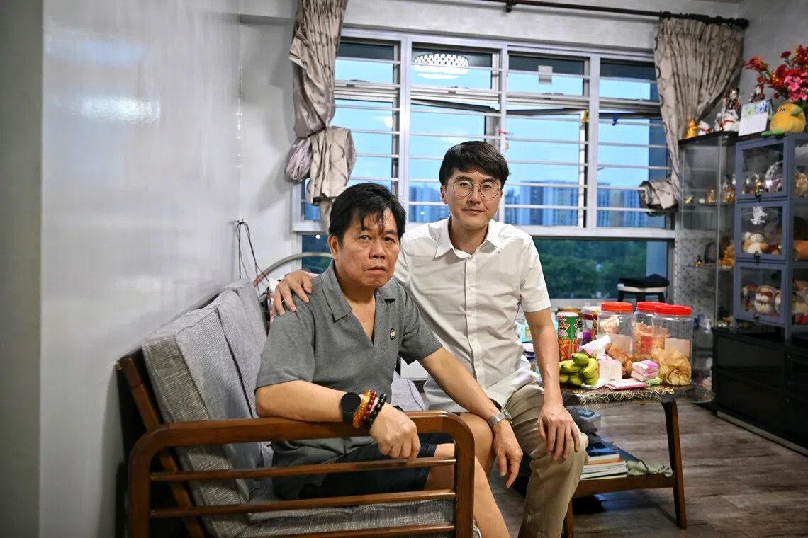 Ang Liu Kiow died of coronary artery disease on Oct 14. Her son Wilson Leong (right) and husband Leong Loon Wah are pictured here in their home on Oct 20.