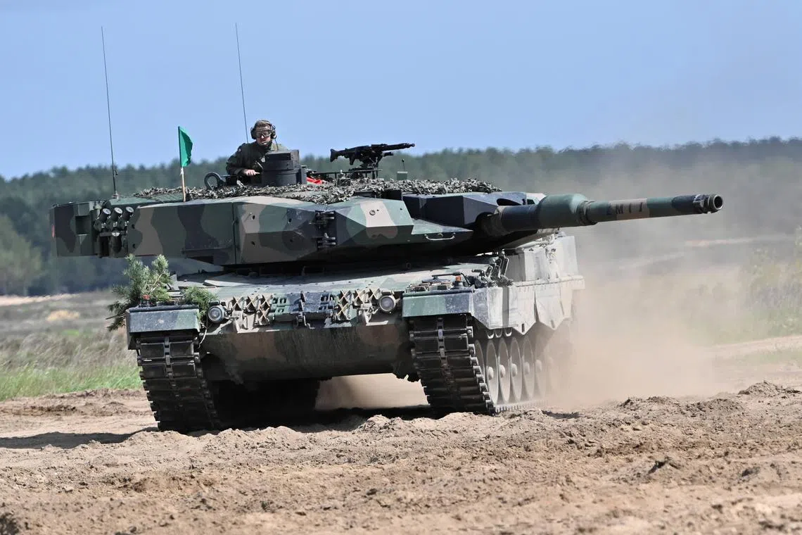A 'Leopard 2PL' tank of the Polish army at firing range Drawsko Pomorskie, in north-west Poland, on May 27, 2022.