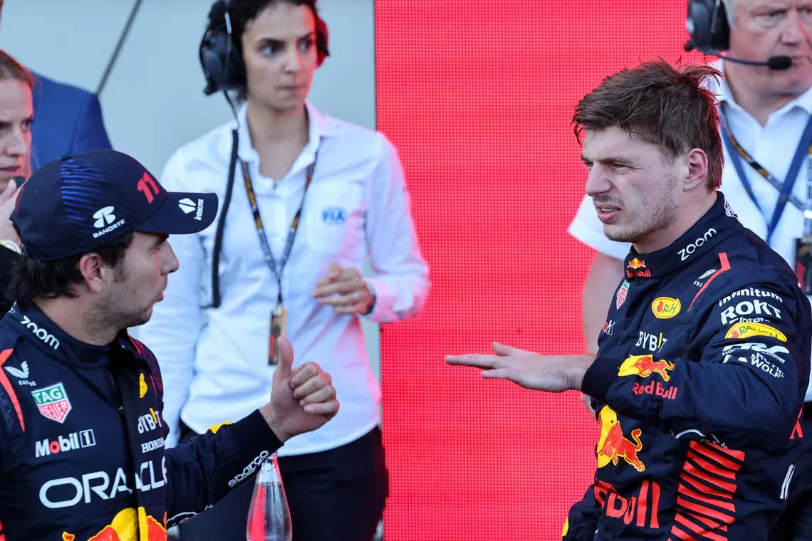 Red Bull Racing's Mexican driver Sergio Perez (left) and Dutch teammate Max Verstappen after the sprint race on Saturday ahead of the Formula One Azerbaijan Grand Prix at the Baku City Circuit in Baku.