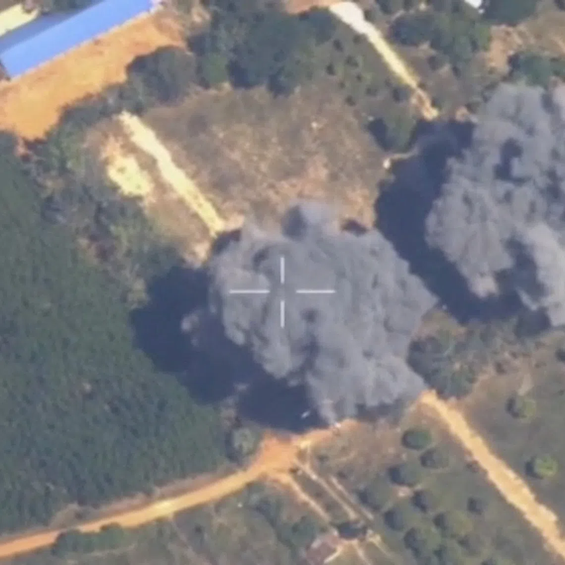 FILE PHOTO: Footage shows smoke rising following what Thailand said was airstrikes carried out in Cambodia along a disputed border area, in Preah Netr Preah, Banteay Meanchey Province, Cambodia, in this screen grab taken from a handout video released on December 15, 2025. Royal Thai Army/Handout via REUTERS