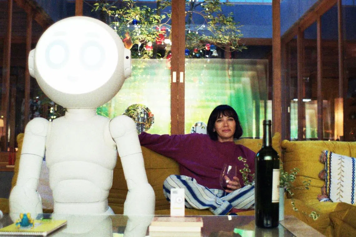 A scene from Apple TV+'s dark drama-comedy Sunny starring Rashida Jones and featuring the eponymous Sunny.