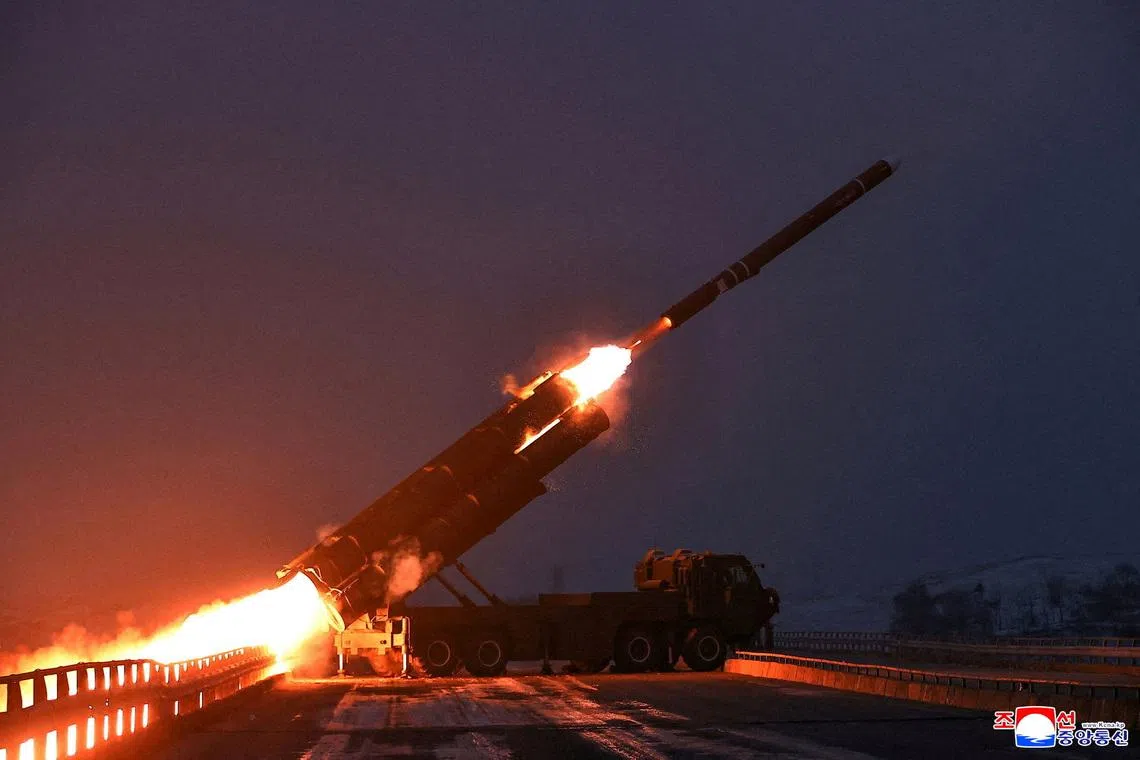 FILE PHOTO: A projectile flies mid-air on the day North Korean leader Kim Jong Un oversaw a long-range strategic cruise missile launching drill, according to local media, at an unknown location, December 28, 2025, in this pictured released December 29, 2025 by North Korea's official Korean Central News Agency.  KCNA via REUTERS   /File Photo