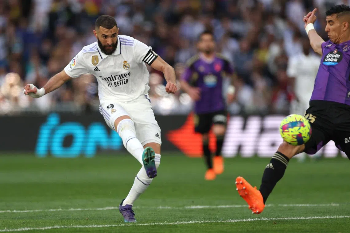 Real Madrid's French forward Karim Benzema scores his team's second goal in Madrid, on April 2, 2023.