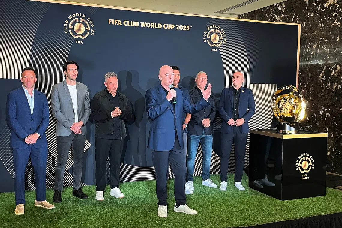 Soccer Football - FIFA Club World Cup - Legends Event - New Jersey, U.S. - July 12, 2025 FIFA president Gianni Infantino talks as former footballers Alessandro Del Piero, Kaka, Roberto Baggio, Ronaldo, Hristo Stoichkov and Esteban Cambiasso look on during a Legends event with the trophy FIFA/Handout via REUTERS