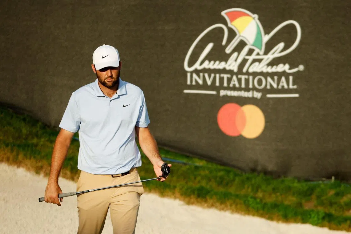 Scottie Scheffler of the United States looks over a putt on the 18th hole during the second round of the Arnold Palmer Invitational.
