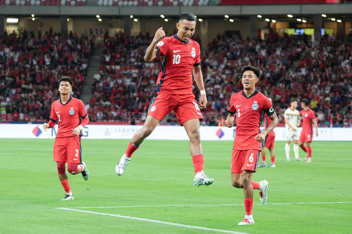 Faris Ramli, flanked by Irfan Najeeb (left) and Shah Shahiran, jumping for joy after making it 2-0 against Thailand in the 2024 ASEAN Championship before the Thais came back to win 4-2.