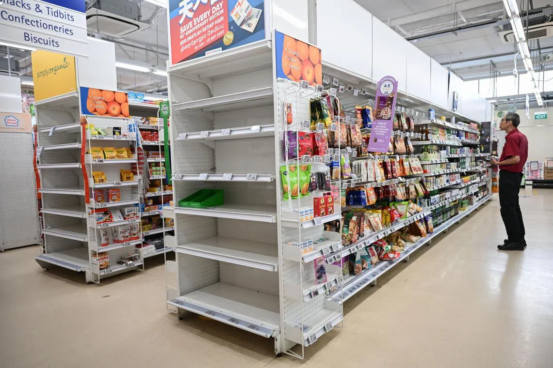 ST20230911_202370760528/sffp11/Shintaro Tay/Chin Soo Fang/

Empty shelves spotted at the FairPrice outlet at Enabling Village in Lengkok Bahru on Sep 11, 2023.
ST Exclusive - The FairPrice outlet at Enabling Village in Lengkok Bahru will close its doors in Oct. Launched on Dec 2 in 2015, this was FairPrice’s first “Enabled Store” designed to meet the needs of Singapore’s rapidly ageing population and support persons with disabilities to live actively and independently. It has special features like wheelchair friendly trolleys and magnifying glasses. Customers ST spoke to did not know about the impending closure but were not surprised given the low footfall.