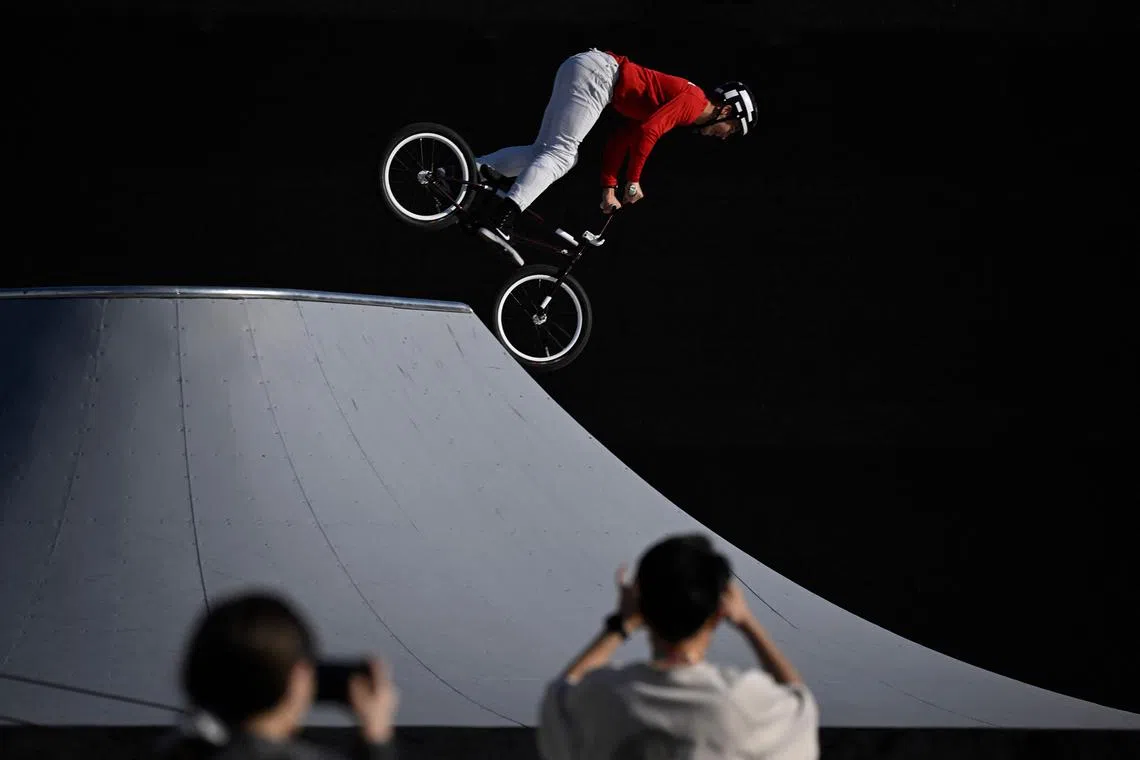 A BMX freestyle rider taking part in a training session for the Olympic Qualifier Series, ahead of the Paris 2024 Olympic and Paralympic Games, in Shanghai on May 15, 2024. 