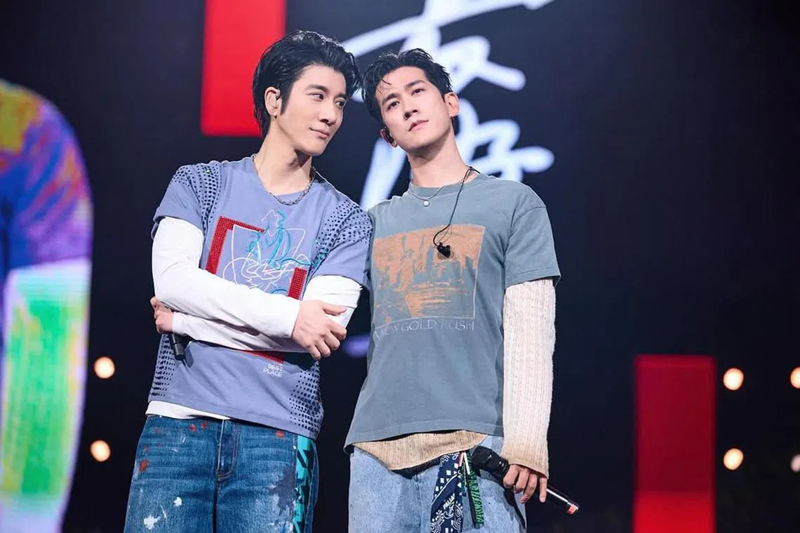 Aarif Rahman (right) shares a photo with Wang Leehom on social media on June 21.