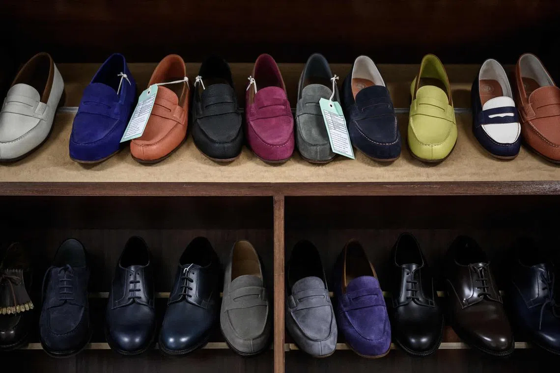 Loafers and other formal shoes of French shoemaker Weston on display at the company's factory in Limoges.