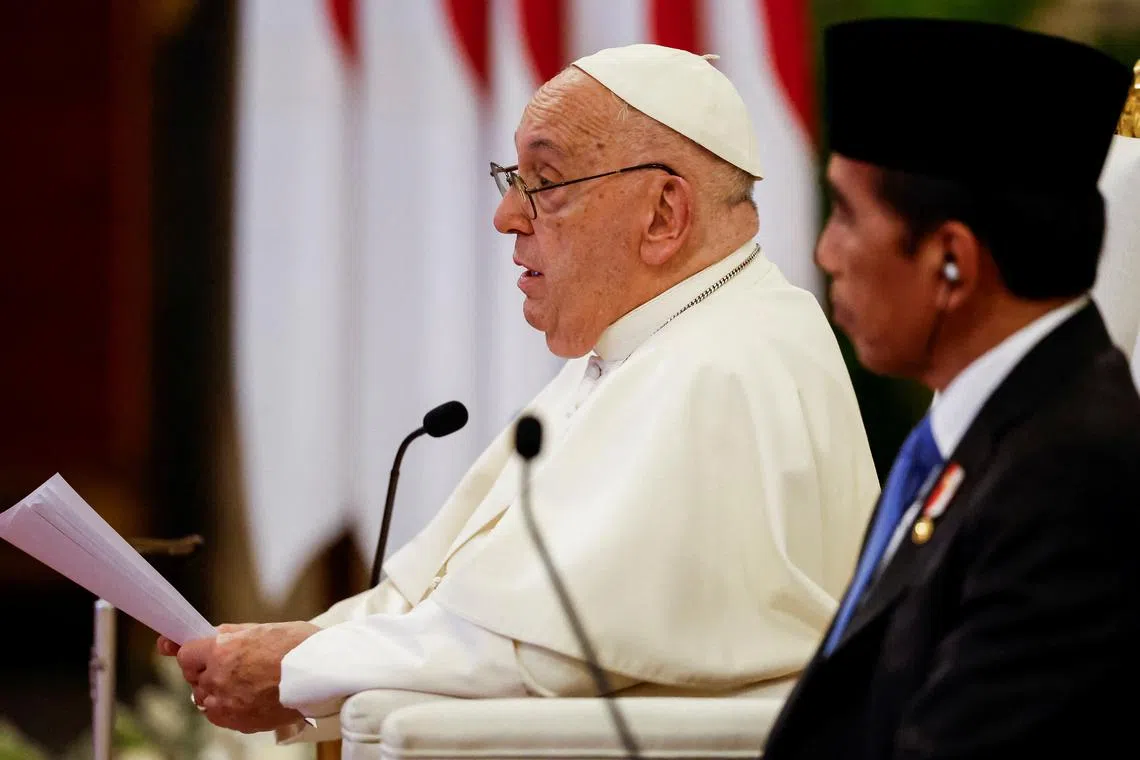 Pope Francis delivers his address as Indonesian President Joko Widodo listens during a meeting with Indonesian authorities, civil society and the diplomatic corps, during his apostolic visit to Asia, at the Presidential Palace in Jakarta, Indonesia, September 4, 2024. REUTERS/Willy Kurniawan/Pool