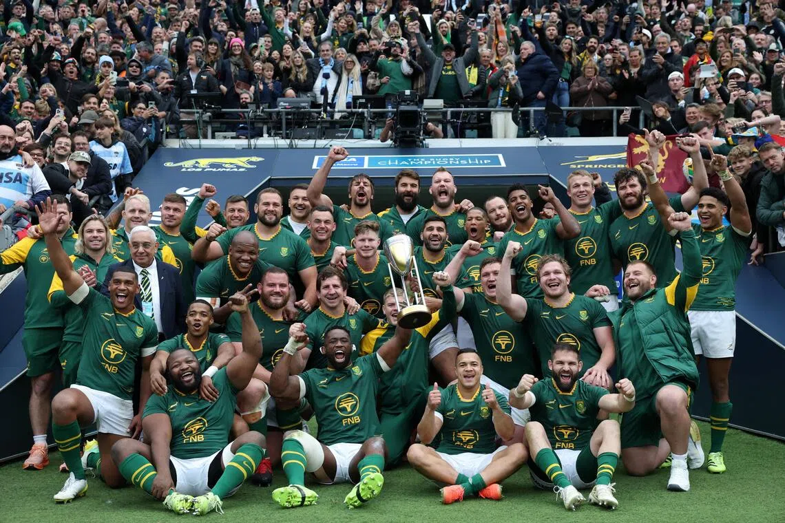 South Africa's Siya Kolisi holding up the Rugby Championship trophy with his teammates at Twickenham in London on Oct 4, 2025.