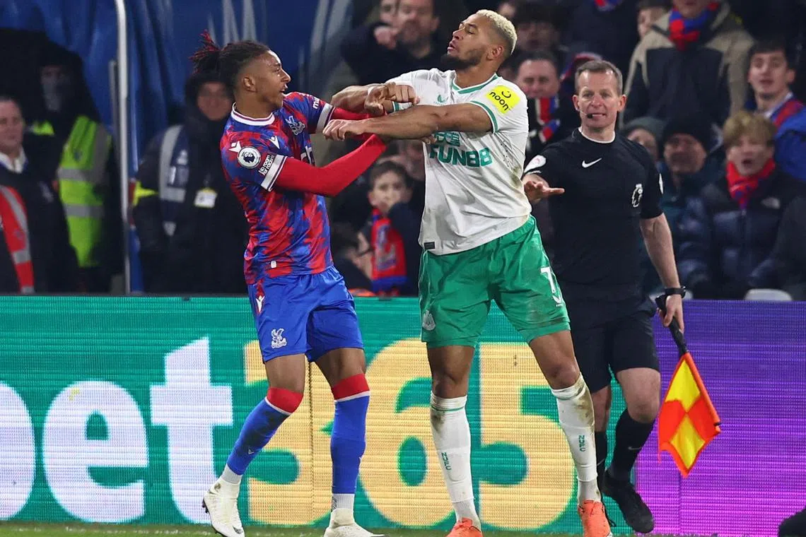 Newcastle United's Joelinton (right) and Crystal Palace's Michael Olise clash.