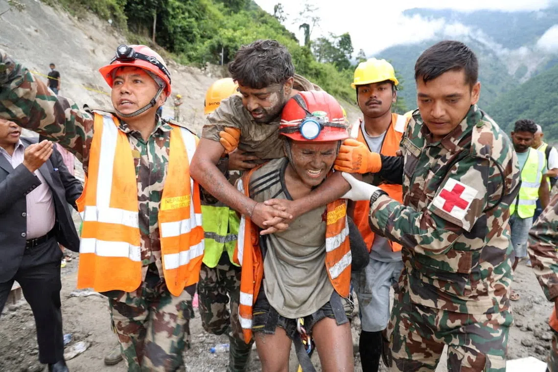 How two men survived nine days in a Nepal flood tunnel