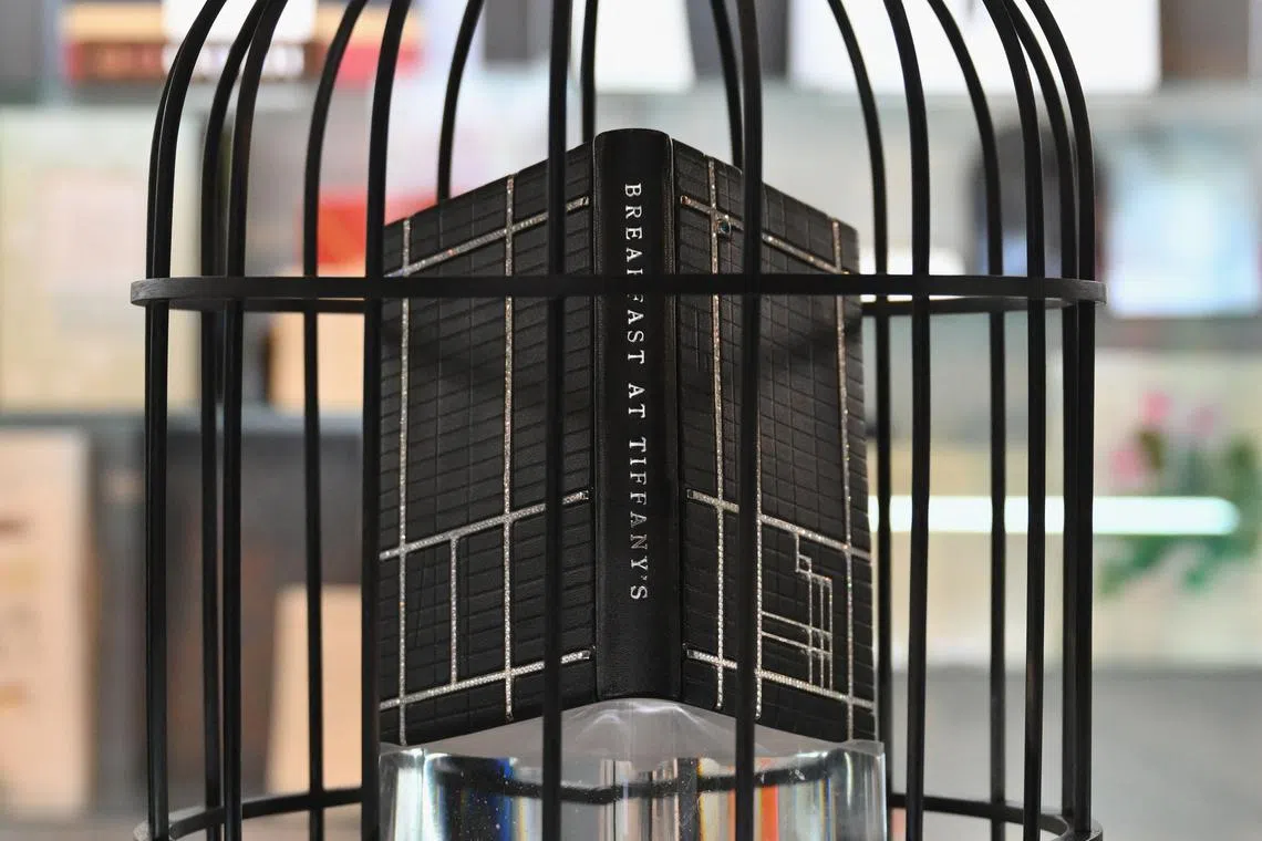 The one-of-a-kind volume is signed by the author and decorated with almost 30 carats of diamonds and a sapphire.