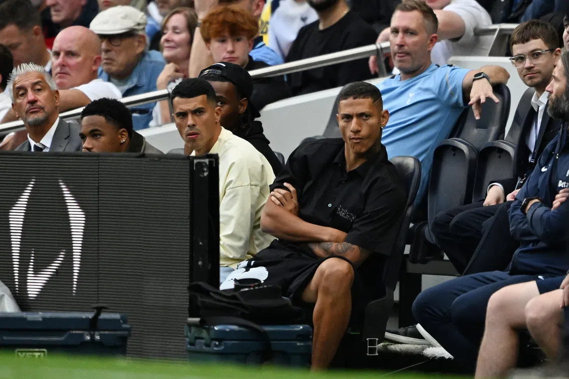 Soccer Football - Premier League - Tottenham Hotspur v Everton - Tottenham Hotspur Stadium, London, Britain - September 12, 2026 Tottenham Hotspur's Richarlison, Pedro Porro, Destiny Udogie and Wilson Odobert watch the match REUTERS/Dylan Martinez EDITORIAL USE ONLY. NO USE WITH UNAUTHORIZED AUDIO, VIDEO, DATA, FIXTURE LISTS, CLUB/LEAGUE LOGOS OR 'LIVE' SERVICES. ONLINE IN-MATCH USE LIMITED TO 120 IMAGES, NO VIDEO EMULATION. NO USE IN BETTING, GAMES OR SINGLE CLUB/LEAGUE/PLAYER PUBLICATIONS. PLEASE CONTACT YOUR ACCOUNT REPRESENTATIVE FOR FURTHER DETAILS..