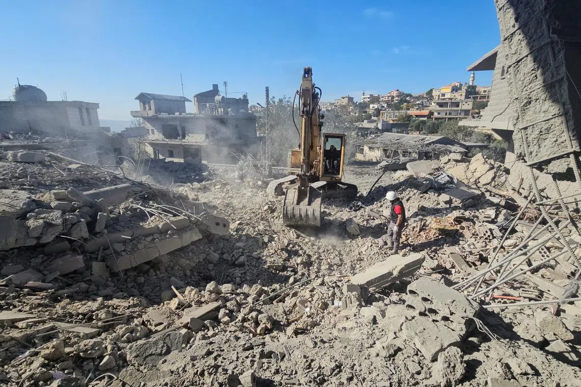 Rescuers work at a site damaged by Israeli strikes in Yohmor, in Lebanon's Bekaa Valley, October 29, 2024. REUTERS/Maher Abou Taleb