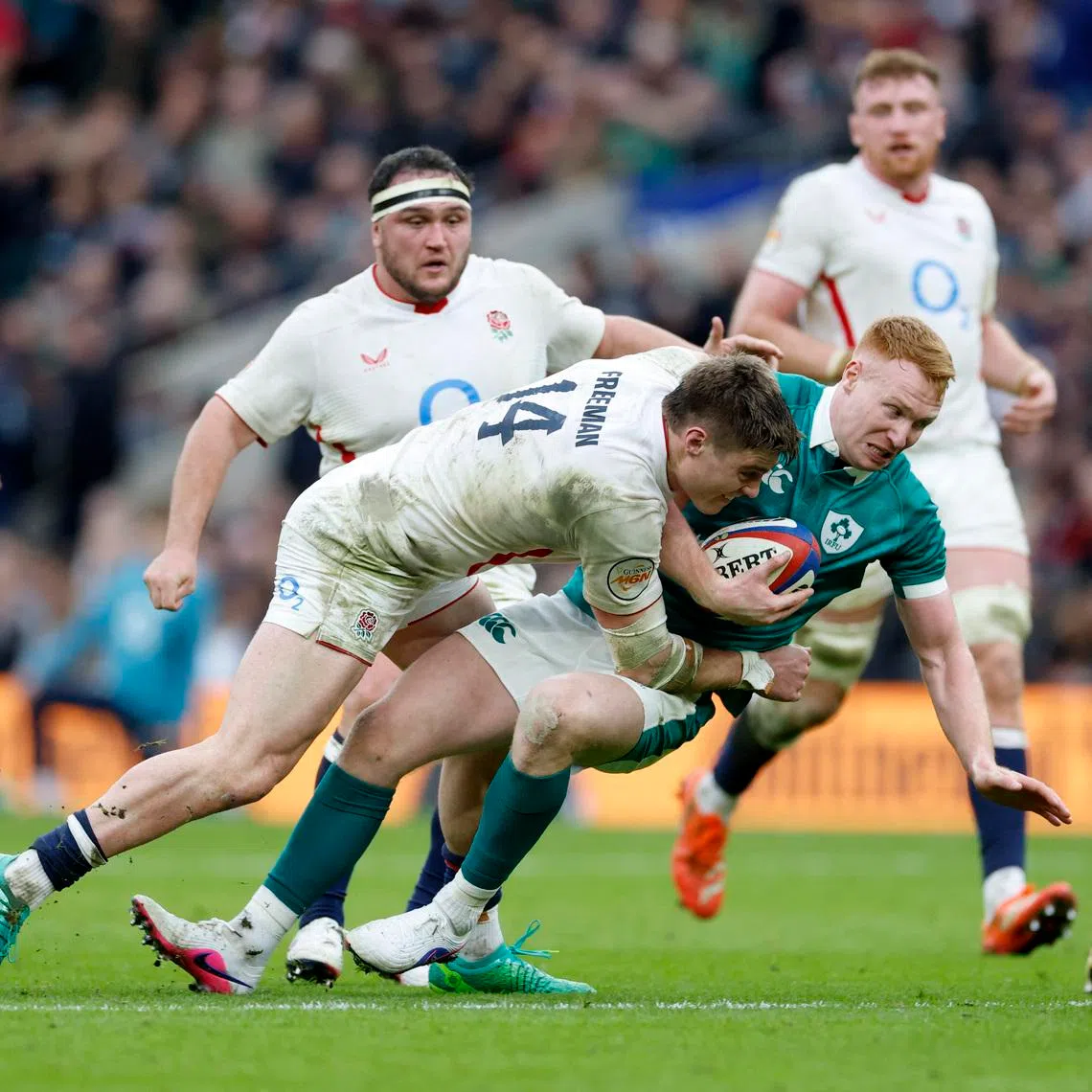 Rugby Union - Six Nations Championship - England v Ireland - Allianz Stadium, Twickenham, Britain - February 21, 2026 England's Tommy Freeman in action with Ireland's Ciaran Frawley Action Images via Reuters/Peter Cziborra