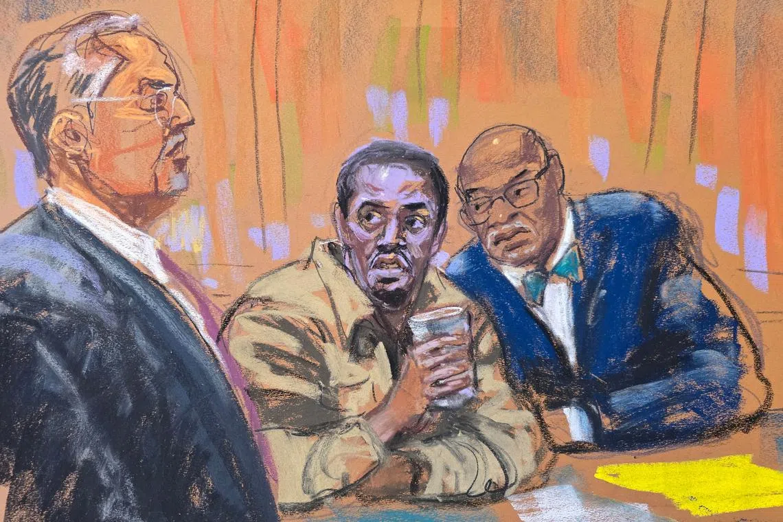 FILE PHOTO: Sean \"Diddy\" Combs attends a pre-trial conference in his sex trafficking case with his attorneys Marc Agnifilo and Anthony Ricco in New York City, New York, U.S., December 18, 2024 in this courtroom sketch. REUTERS/Jane Rosenberg/File Photo