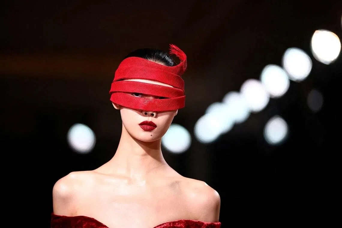 A model presents a creation by designer Elie Saab as part of his Haute Couture Fall/Winter 2026-2027 collection show in Paris, France, July 8, 2026. REUTERS/Sarah Meyssonnier TPX IMAGES OF THE DAY