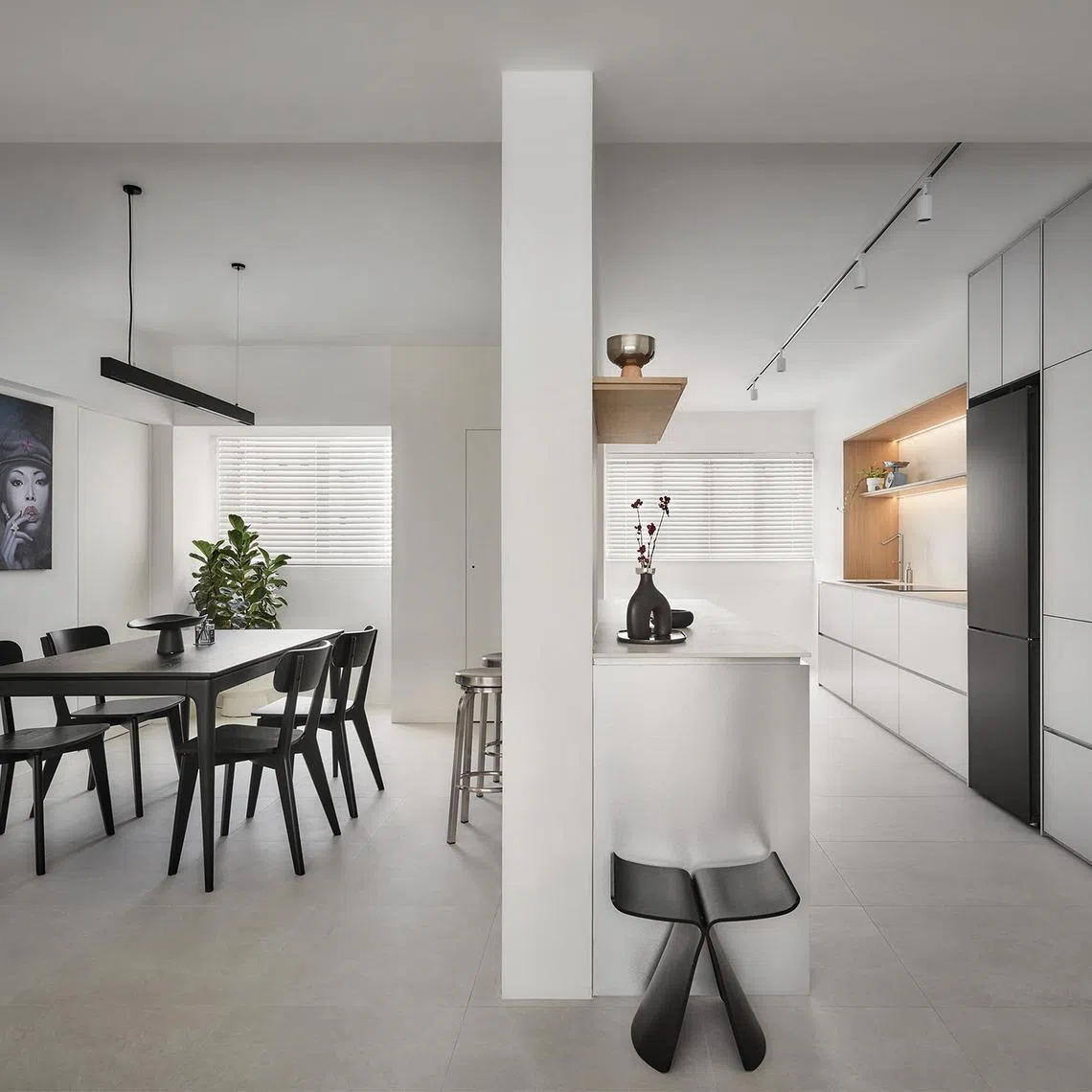 This bachelorette pad is sleek but cosy, with plenty of space for the owner to indulge in her hobbies.