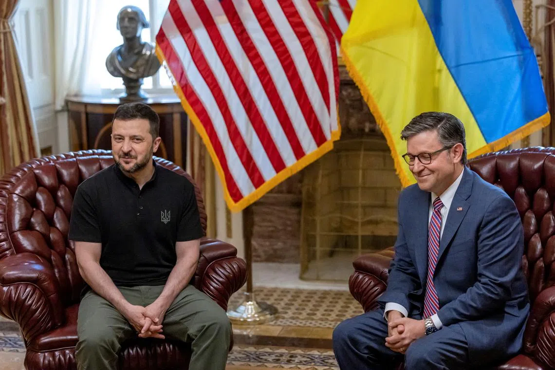 FILE PHOTO: U.S. House Speaker Mike Johnson meets with Ukrainian President Volodymyr Zelenskiy on the sidelines of NATO's 75th anniversary summit, on Capitol Hill in Washington, U.S., July 10, 2024. REUTERS/KEVIN Mohatt/File Photo