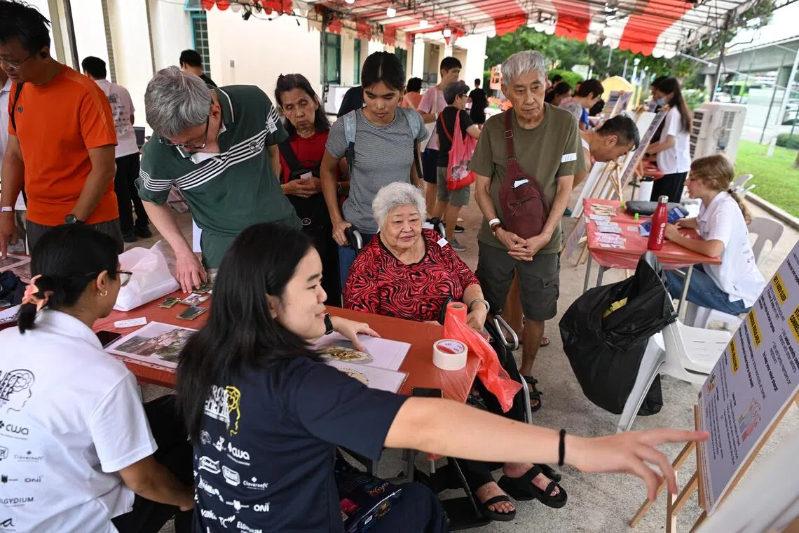 NUS Medicine students hold free health screenings in Queenstown to boost dementia awareness