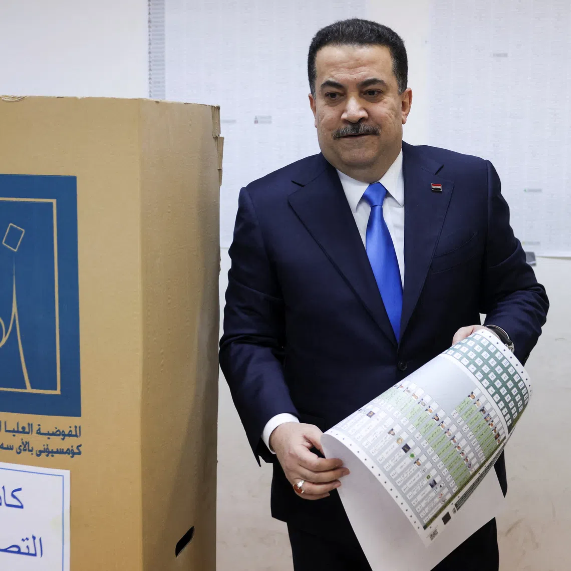 Iraqi Prime Minister Mohammed Shia al-Sudani votes at a polling station in the Green Zone during the parliamentary election, in Baghdad, Iraq, November 11, 2025. REUTERS/Ahmed Saad