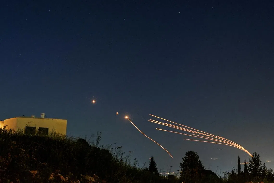 FILE PHOTO: Israel's Iron Dome anti-missile system intercepts rockets launched from Lebanon towards Israel over the Israeli Lebanese border, as seen from northern Israel, April 12, 2024. REUTERS/Ayal Margolin /File Photo