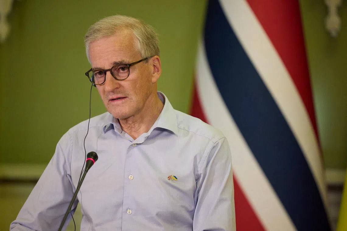 FILE PHOTO: Norway's Prime Minister Jonas Gahr Stoere attends a joint news briefing with Ukraine's President Volodymyr Zelenskiy, as Russia's attack on Ukraine continues, in Kyiv, Ukraine July 1, 2022. Ukrainian Presidential Press Service/Handout via REUTER/File Photo