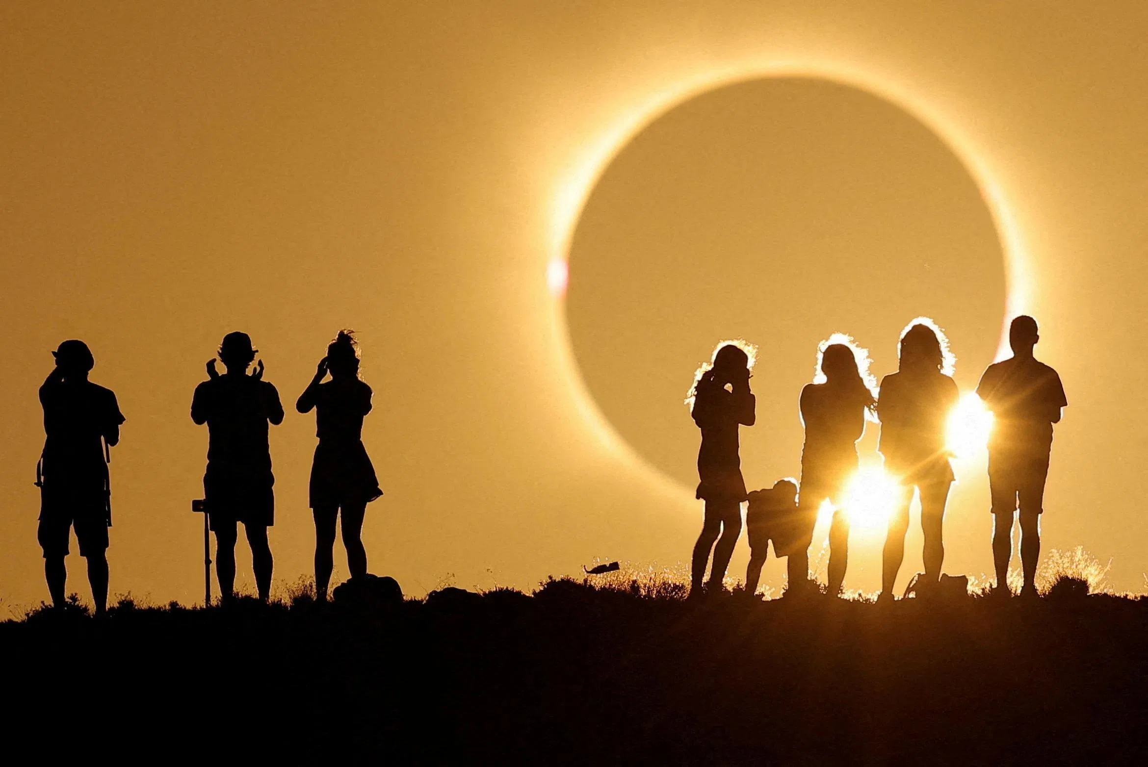 The moon partially covers the sun during a total solar eclipse as seen from the Galactica Centre, near the Javalambre Astrophysical Observatory in Arcos de las Salinas, near Teruel, Spain, August 12, 2026. REUTERS/Christian Hartmann REFILE - CORRECTING INFORMATION FROM 'COMPLETELY COVERS THE SUN' TO 'PARTIALLY COVERS THE SUN' AND LOCATION FROM 'THE JAVALAMBRE ASTROPHYSICAL OBSERVATORY' TO 'THE GALACTICA CENTRE, NEAR THE JAVALAMBRE ASTROPHYSICAL OBSERVATORY'     TPX IMAGES OF THE DAY