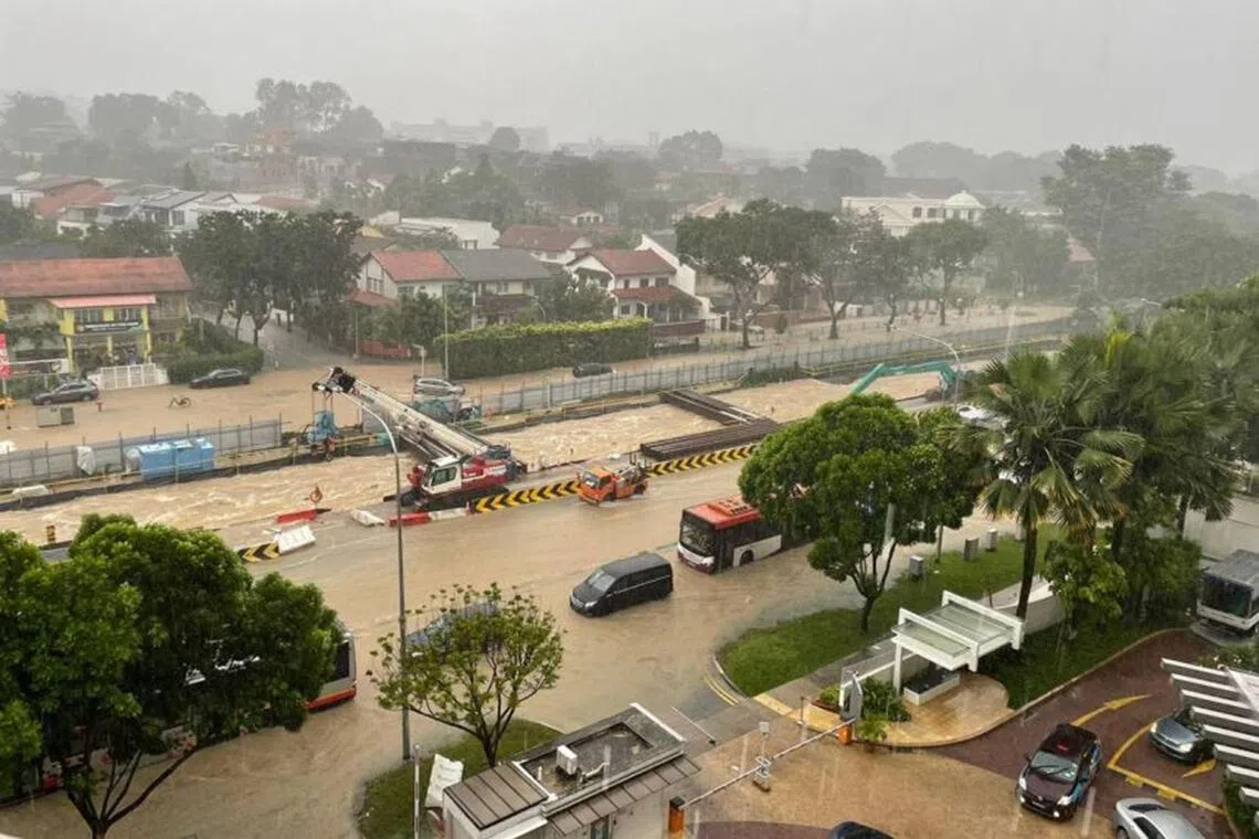 A flash flood in Dunearn Road, from Sime Darby Centre to Binjai Park, rendered the road impassable to traffic on Aug 24, 2021.