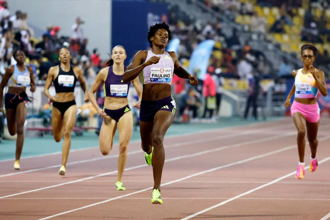 Athletics - Diamond League - Doha - Khalifa International Stadium, Doha, Qatar - June 19, 2026 Dominican Republic's Marileidy Paulino crosses the finish line to win the women's 400m final REUTERS/Ibraheem Abu Mustafa