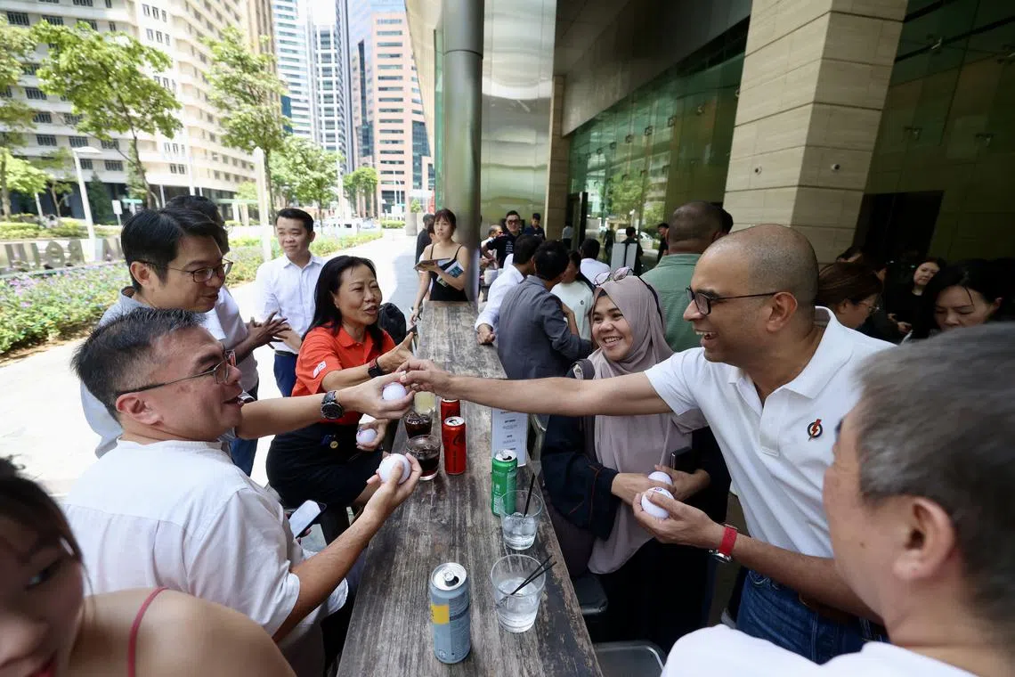 PAP Mental Health Group co-chairperson Janil Puthucheary (right) at a networking session held to commemorate World Mental Health Day on Oct 10.