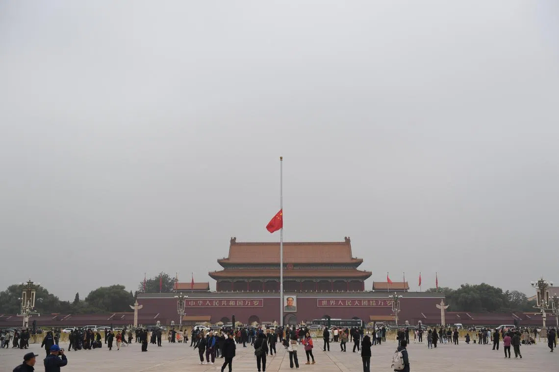 The Chinese national flag flies at half-mast at Tiananmen Square in Beijing, on Nov 2.