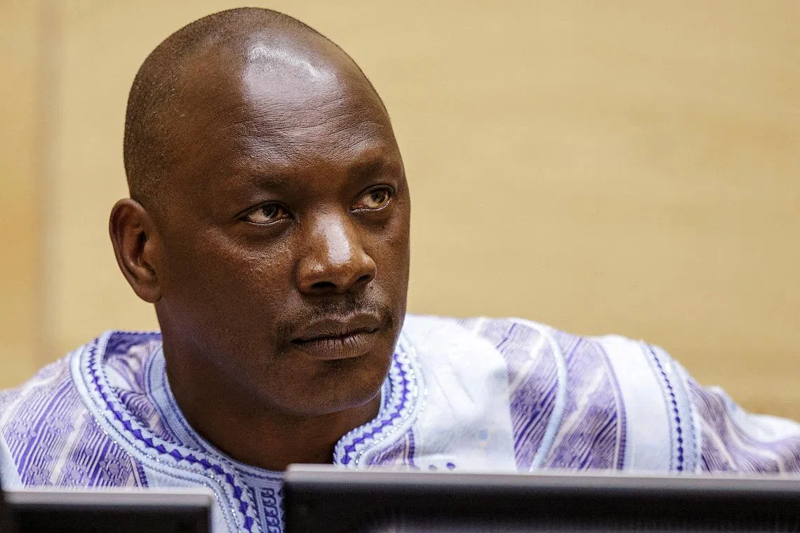 FILE PHOTO: Former Congolese warlord Thomas Lubanga awaits the judges' verdict in the courtroom of the International Criminal Court (ICC) in The Hague, December 1, 2014. REUTERS/Michael Kooren/File Photo