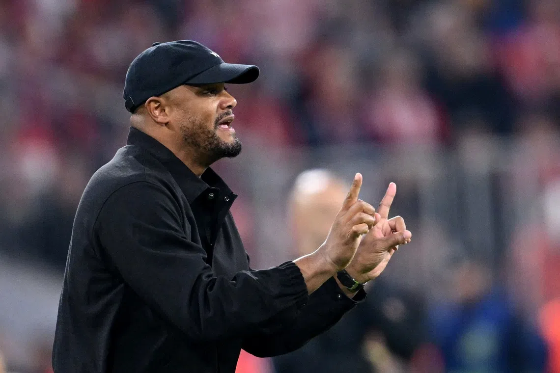 Soccer Football - UEFA Champions League - Bayern Munich v Chelsea - Allianz Arena, Munich, Germany - September 17, 2025 Bayern Munich coach Vincent Kompany reacts REUTERS/Angelika Warmuth