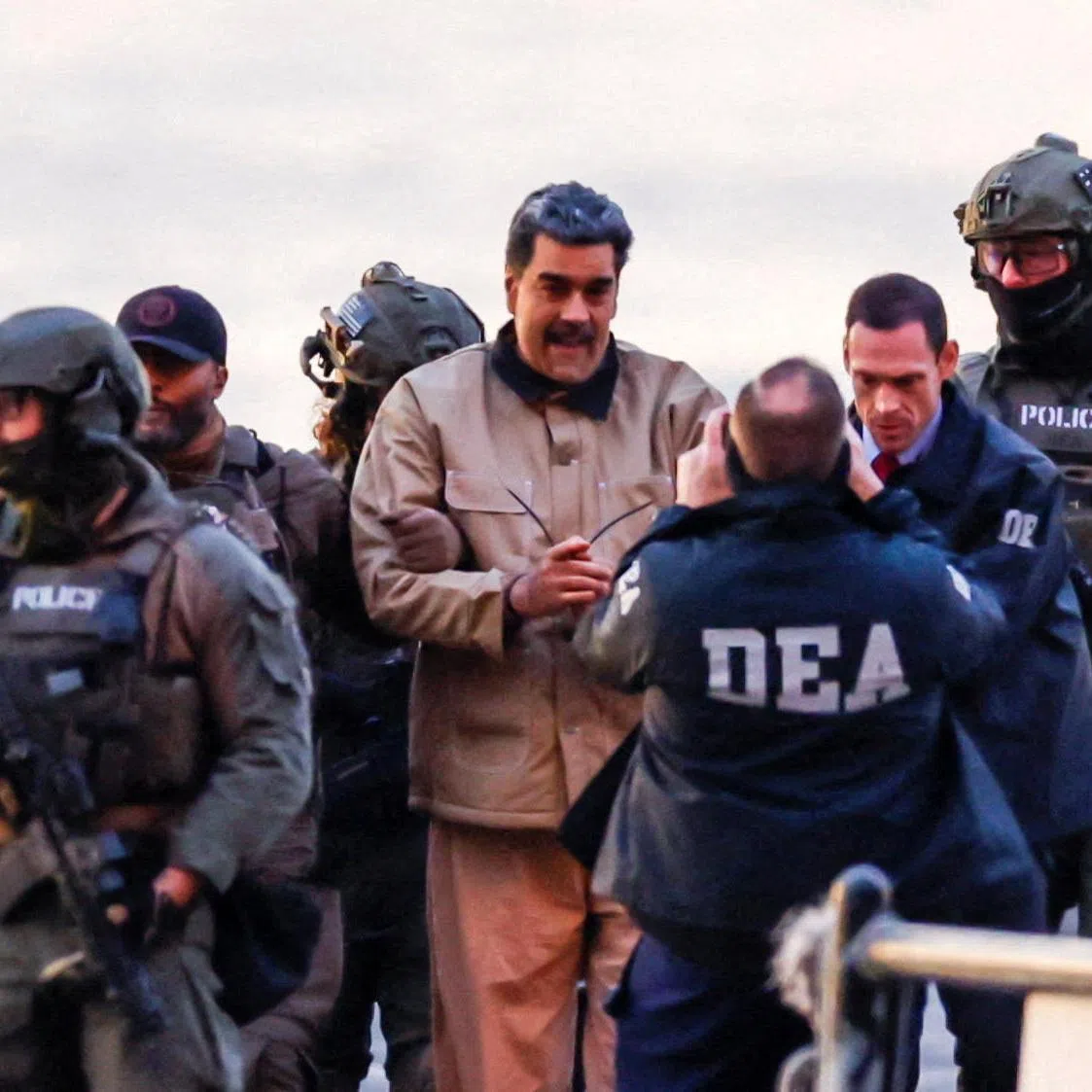 Captured Venezuelan President Nicolas Maduro arrives at the Downtown Manhattan Heliport, as he heads towards the Daniel Patrick Moynihan United States Courthouse in Manhattan for an initial appearance to face U.S. federal charges including narco-terrorism, conspiracy, drug trafficking, money laundering and others in New York City, U.S., January 5, 2026. REUTERS/Eduardo Munoz