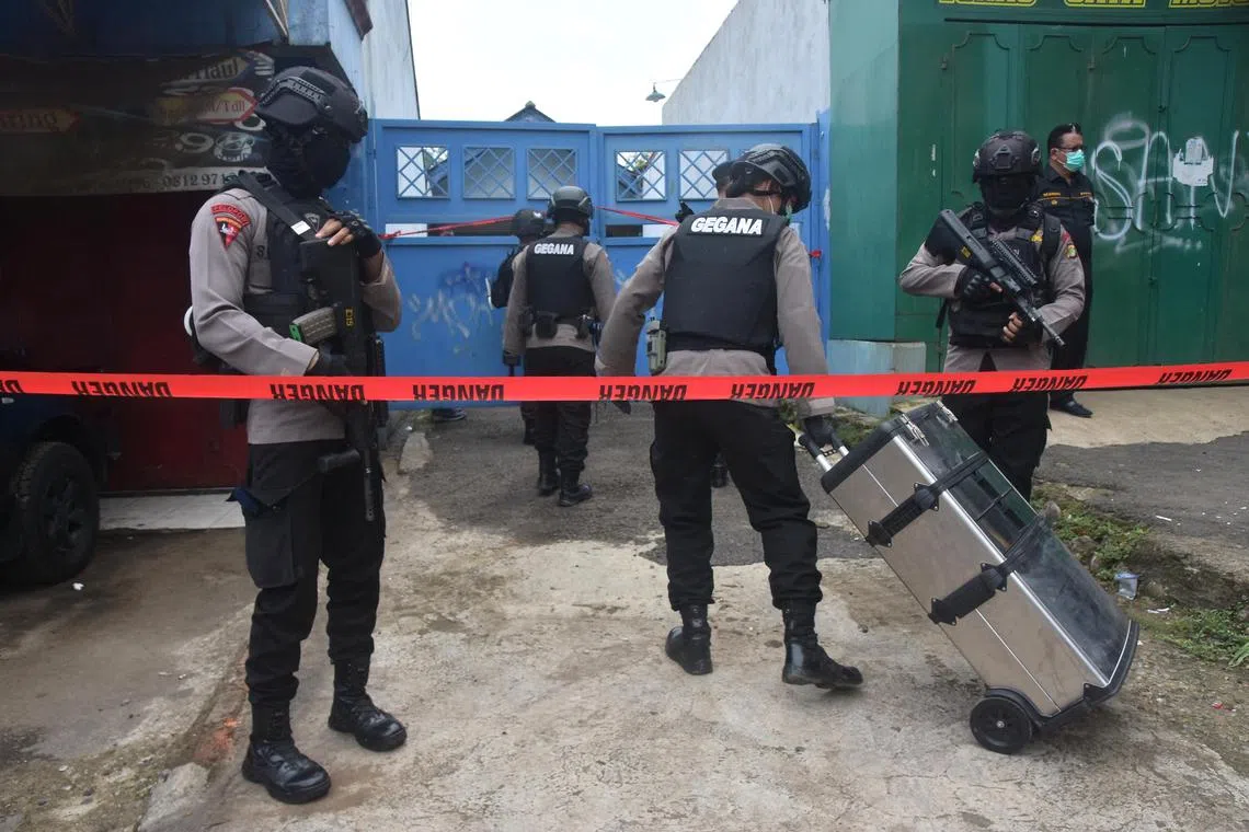 Indonesia's Densus 88 counter-terrorism unit conducting a raid in Cikarang, West Java, in 2021.