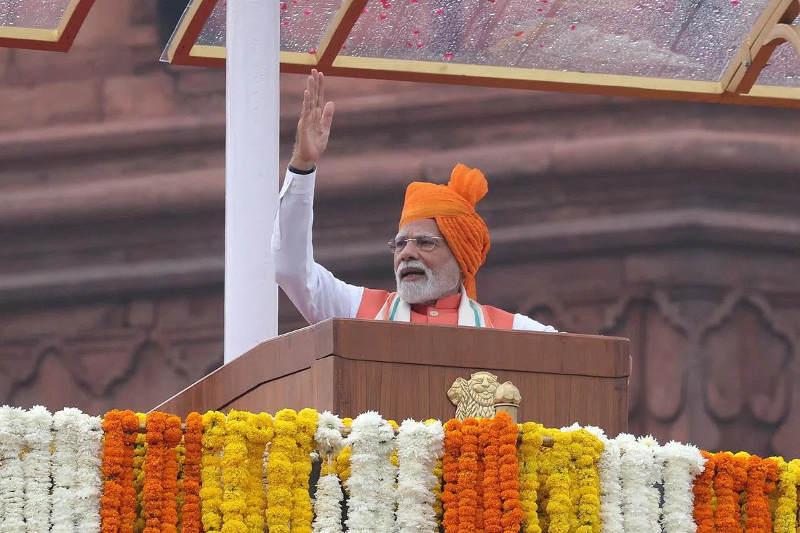 FILE PHOTO: India's Prime Minister Narendra Modi addresses the nation during Independence Day celebrations at the historic Red Fort in Delhi, India, August 15, 2025. REUTERS/Altaf Hussain/File Photo