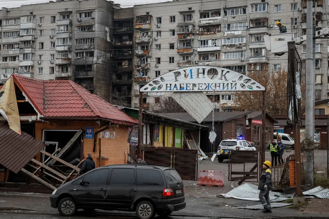 Street market and apartment building which were damaged during a Russian overnight drone strike, amid Russia's attack on Ukraine, in the town of Vyshhorod, Kyiv region, Ukraine, November 30, 2025. REUTERS/Gleb Garanich