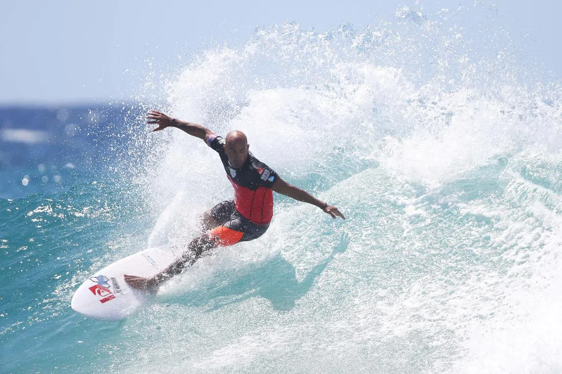 Surfing great Kelly Slater has been granted a wildcard to continue on the World Surf League.