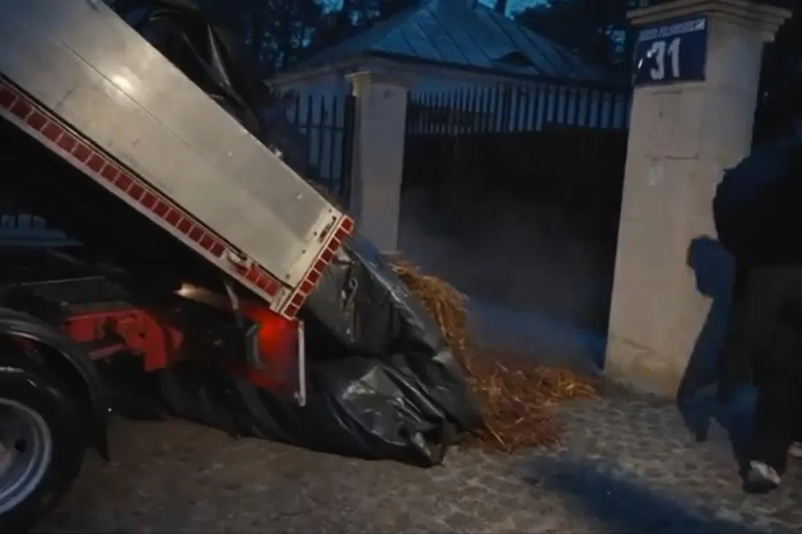 Protesters dumped two tonnes of dung outside the home of the Russian ambassador to Poland, on the second anniversary of Moscow's full-scale invasion of Ukraine. 